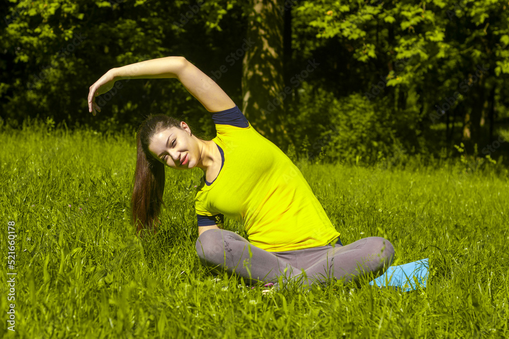 Woman exercising in park Woman exercising in park