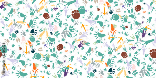 Photography Seamless pattern with traces of various animals and birds in cartoon style isolated on white background