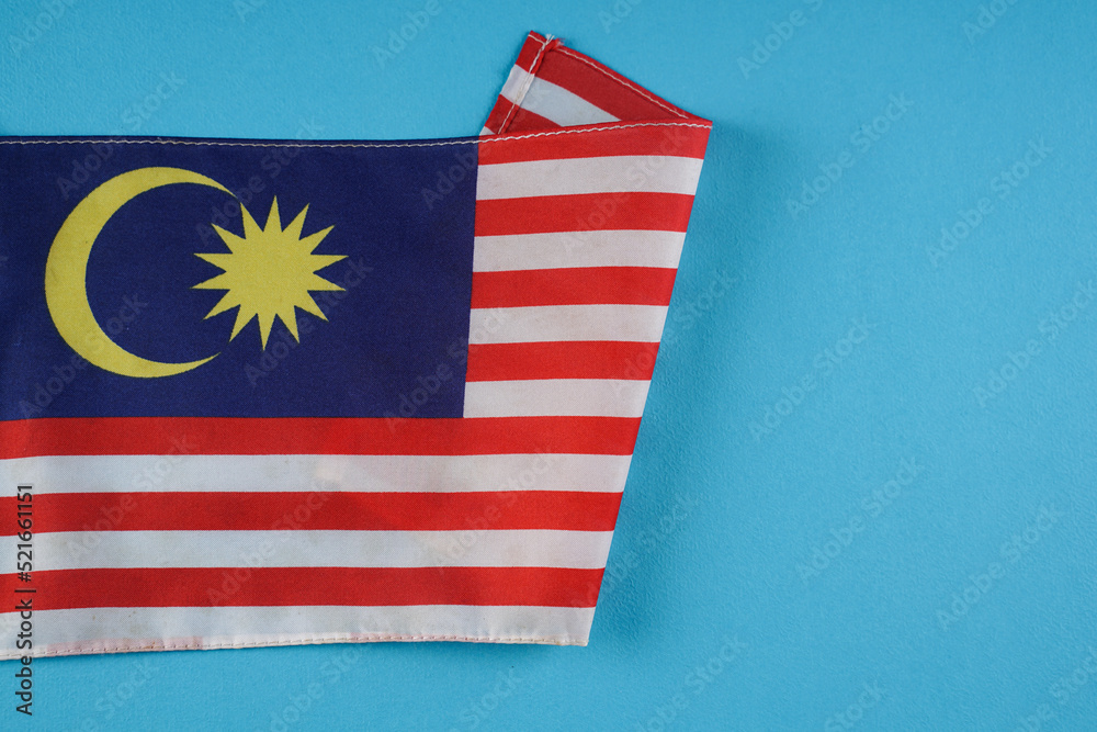 Fototapeta premium Malaysia Flag on blue background 