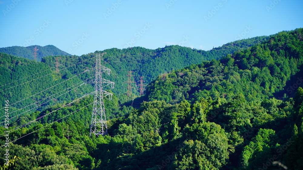 山の中に立つ鉄塔 Stock Photo Adobe Stock