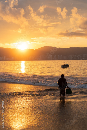 Fisherman at dawn, Acapulco Bay, Mexico