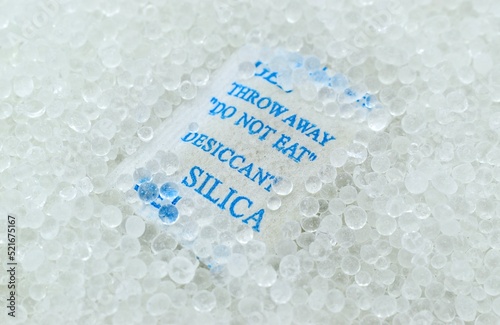 Sachet of new silica gel crystals. It is a desiccant. It adsorbs water vapor.
