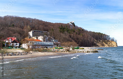 Orlowo cliff and sandy beach on the coast of the Baltic Sea in Gdynia 