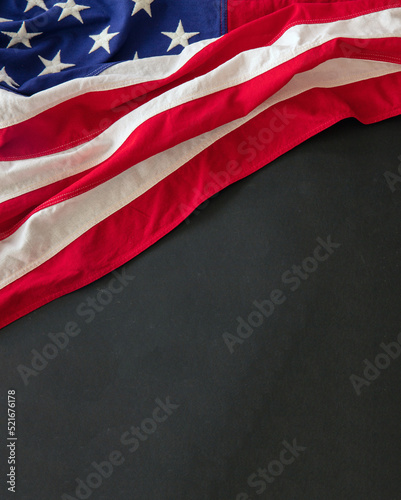 USA Flag on black background, copy space. American holiday template, overhead