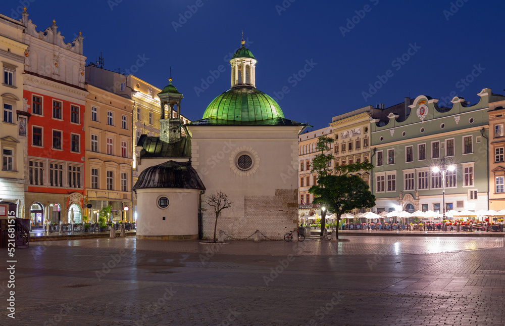 Krakow. Church of St. Wojciech on and market square at dawn.
