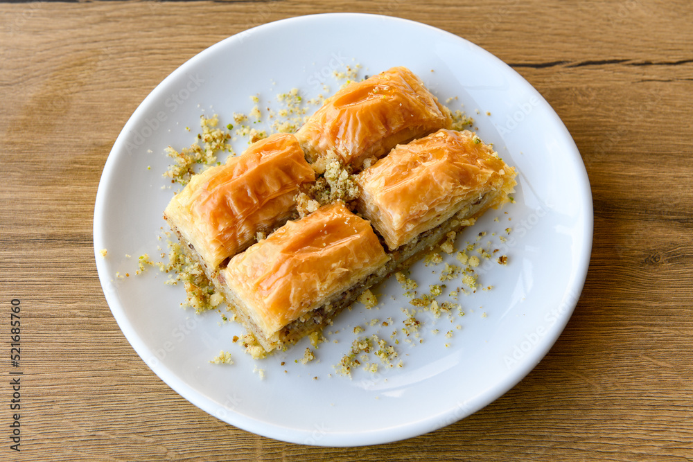Table scene of assorted take out or delivery foods. Traditional Turkish cuisine. Various Turkish desert and cake. Top down view on a table. Table scene of assorted take out or delivery foods. Traditional Turkish cuisine. Various Turkish desert and cake. Top down view on a table.