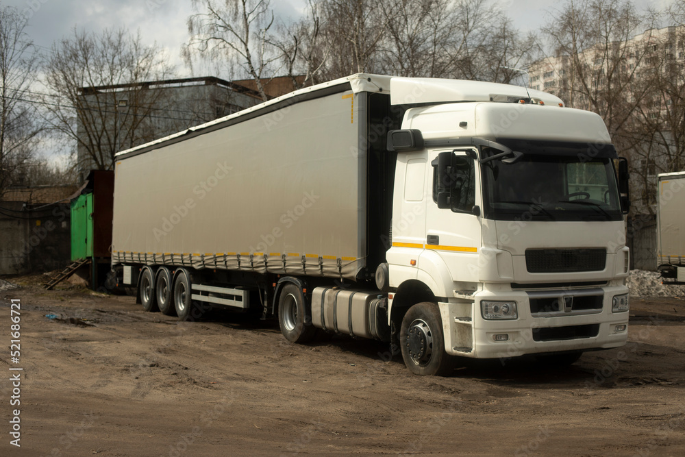 Truck on road. Cargo transportation. Car on highway.