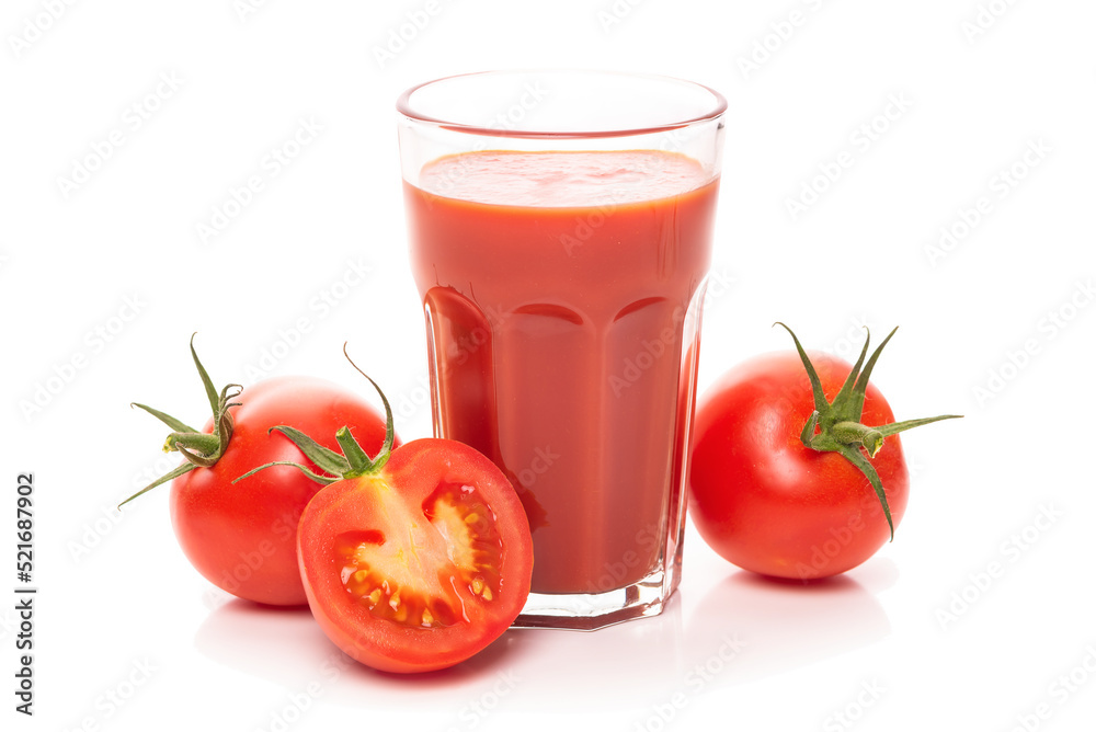 Glass with tomato juice and ripe tomatoes. Isolate on white background Glass with tomato juice and ripe tomatoes. Isolate on white background