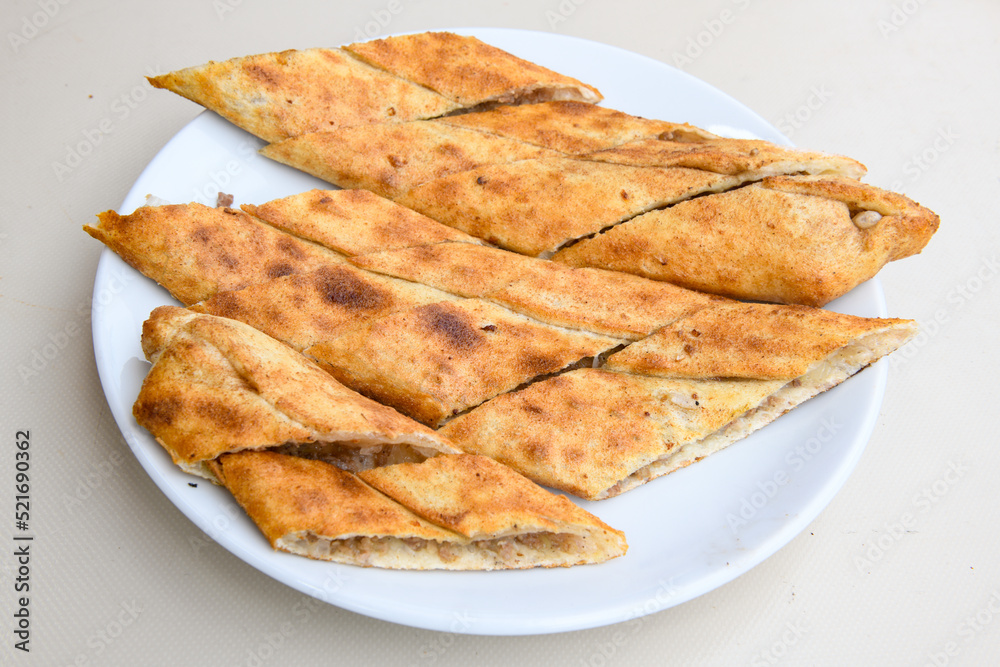 Pide, karisik pide, mixed pita. Turkish pide with sucuk sausage, meat and cheese. Turkish pizza. mixed pita. Pide on white background. Pide, karisik pide, mixed pita. Turkish pide with sucuk sausage, meat and cheese. Turkish pizza. mixed pita. Pide on white background.