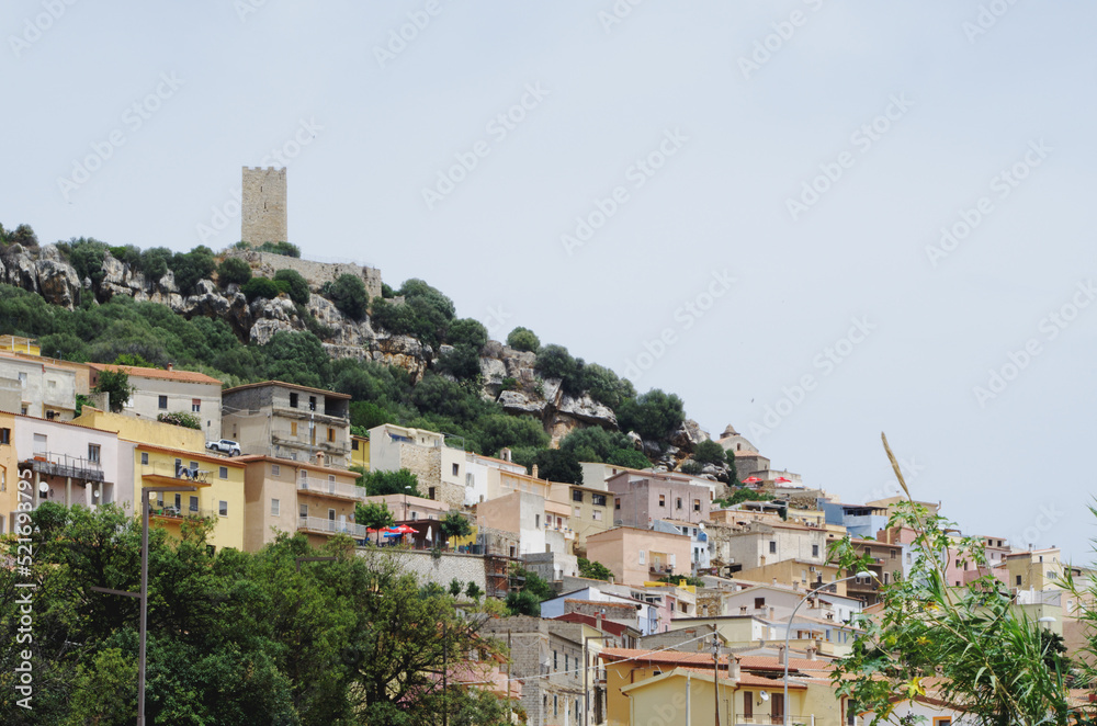 Sardinian village of Posada with the Castello della Fava tower. Sardinia, Italy
