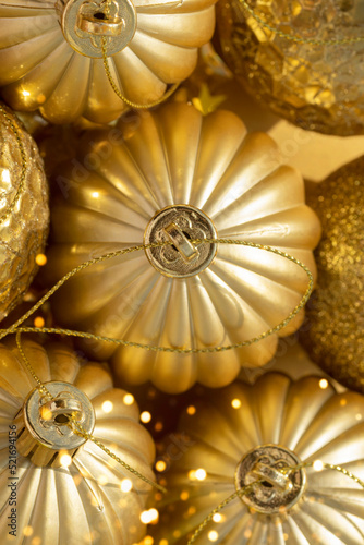 macro detail of beautiful shiny golden Christmas baubles
