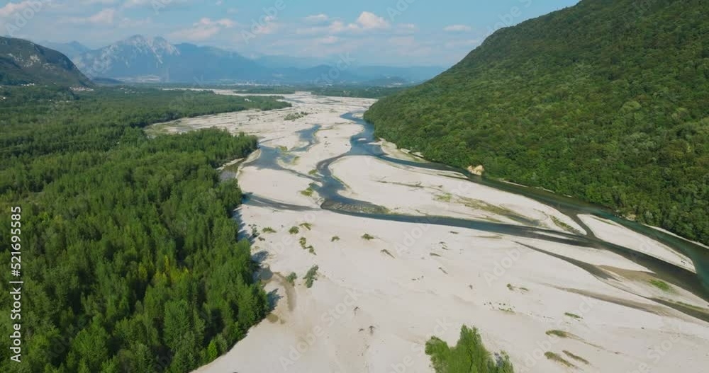 Tagliamento River in Italy. Aerial view of dry River. Drought in Europe. Low Water levels in River becoming stream