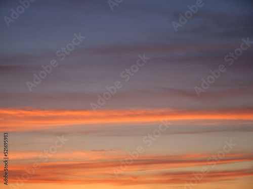 Bright sunset sky, full frame. The sky as a background. © Oleksii