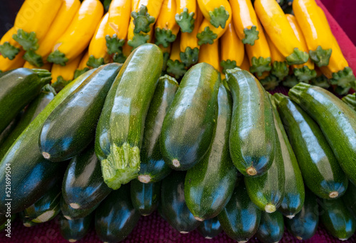 Piles of Yellow and Green Zucchini for Sale