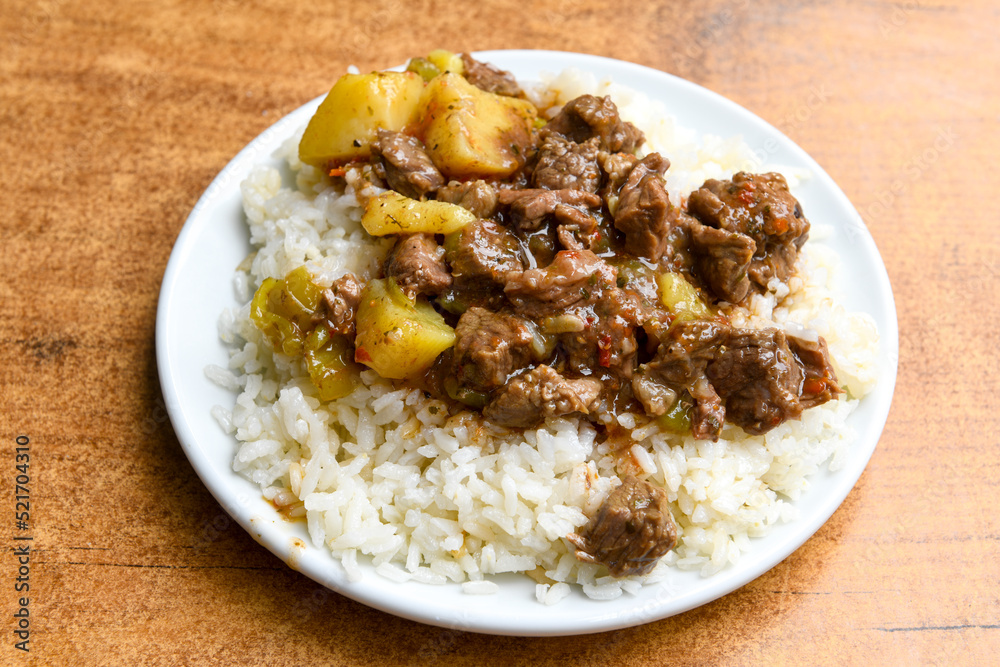 Beef steak grill with rice pilaf, fried potatoes, grilled pepper and tomatoes.Mix Platter with Beef rips, Cutlets, Potatoes and Sauces. Beef steak grill with rice pilaf, fried potatoes, grilled pepper and tomatoes.Mix Platter with Beef rips, Cutlets, Potatoes and Sauces.