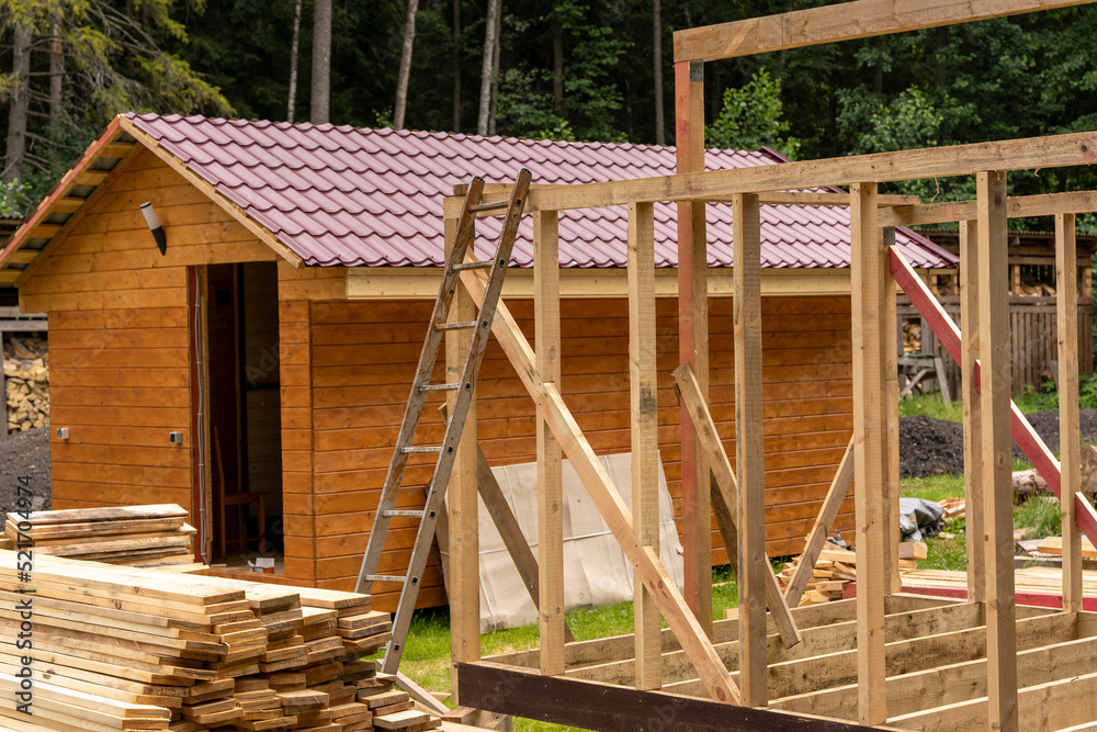 construction of a frame house. Timber frame house, new build roof 