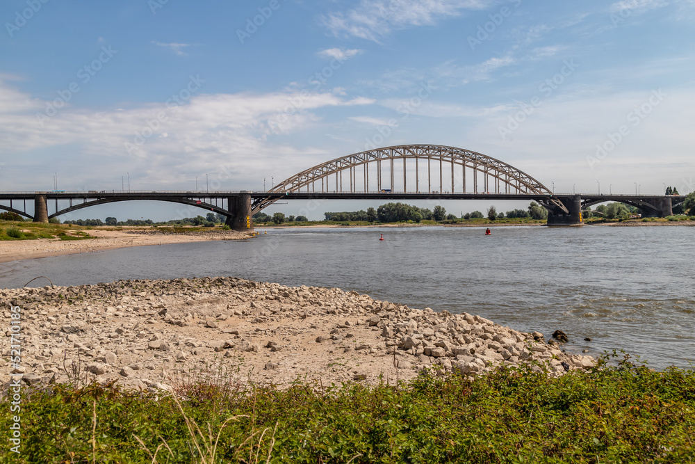 Very low water level in the river Waal at the Waal bridge (Waalbrug) in Nijmegen.