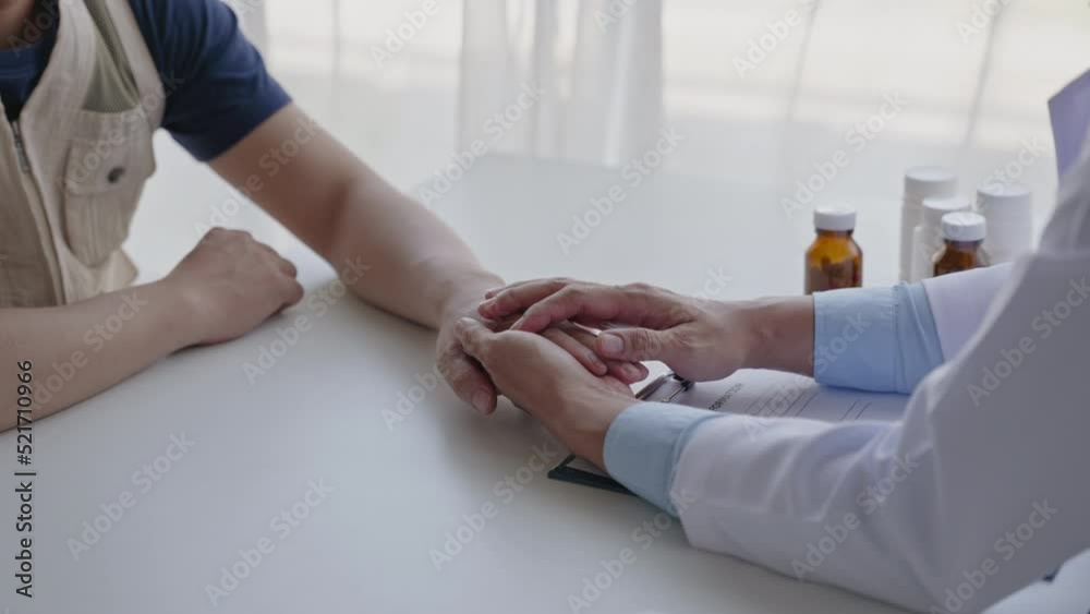 Close-up hands of doctor treatments and consults on patient in medical office clinic. Close-up hands of doctor treatments and consults on patient in medical office clinic.