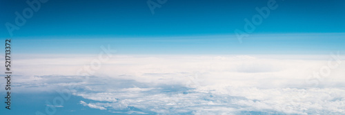beautiful blue sky with white clouds heaven horizon over planet earth world, view from the airplane or satellite. atmosphere or stratosphere space layer. astronomy and geology sciense nature. banner