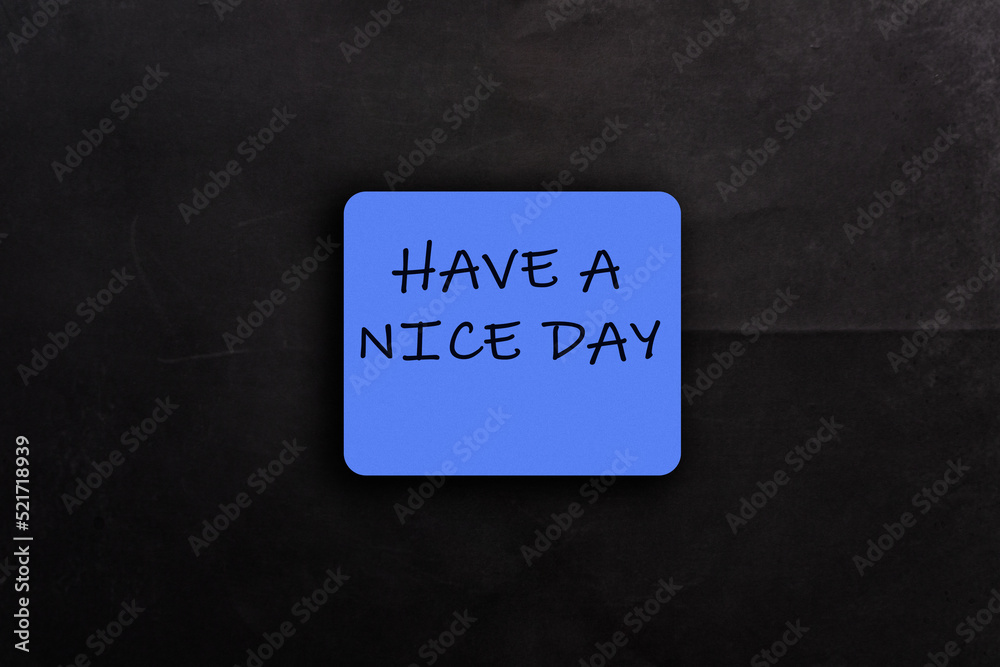 Blue card with words Have Nice Day on black background Blue card with words Have Nice Day on black background