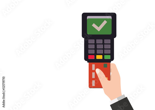 Bezahlen mit Kreditkarte am Kartenzahlungsgerät photo