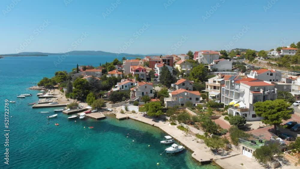 Croatia. Coast of the Adriatic Sea. Small town by the sea. Summer. Tourist season. Popular place to relaxation. Drone. Aerial view. The camera moves up Croatia. Coast of the Adriatic Sea. Small town by the sea. Summer. Tourist season. Popular place to relaxation. Drone. Aerial view. The camera moves up