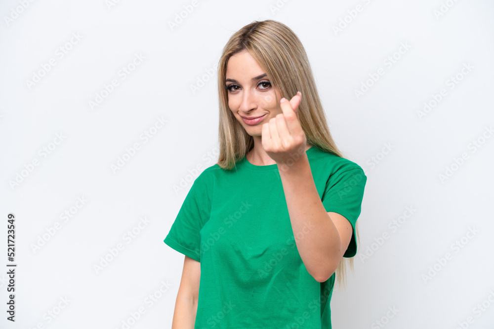 Pretty blonde woman isolated on white background making money gesture Pretty blonde woman isolated on white background making money gesture