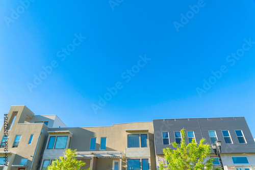 Exterior of a complex building in a low angle view at Daybreak in South Jordan, Utah