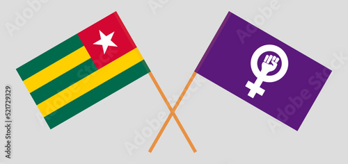 Crossed flags of Togo and Feminism. Official colors. Correct proportion