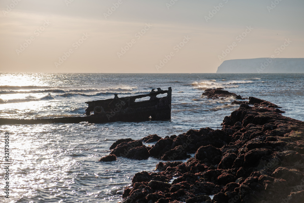 Fotografie Old ship wreck at low tide