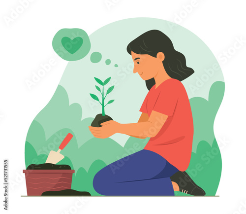 Girl Planting a Sapling of Plant in Garden.