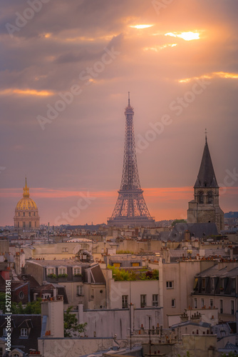 Eiffel tower and parisian roofs at sunrise Paris  France
