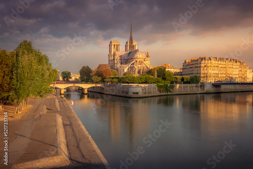 Notre Dame of Paris on Seine River reflection at sunrise  France