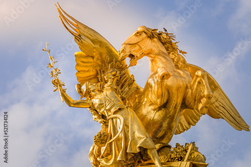 Fame Sculpture in Pont Alexandre III at sunny day, Paris, france
