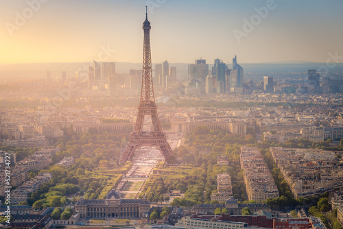 Eiffel tower and La Defense at dramatic sunrise Paris, France