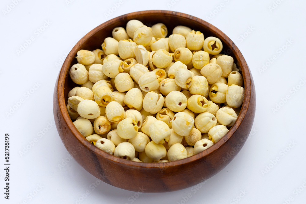 Dried lotus seeds on white background. Dried lotus seeds on white background.