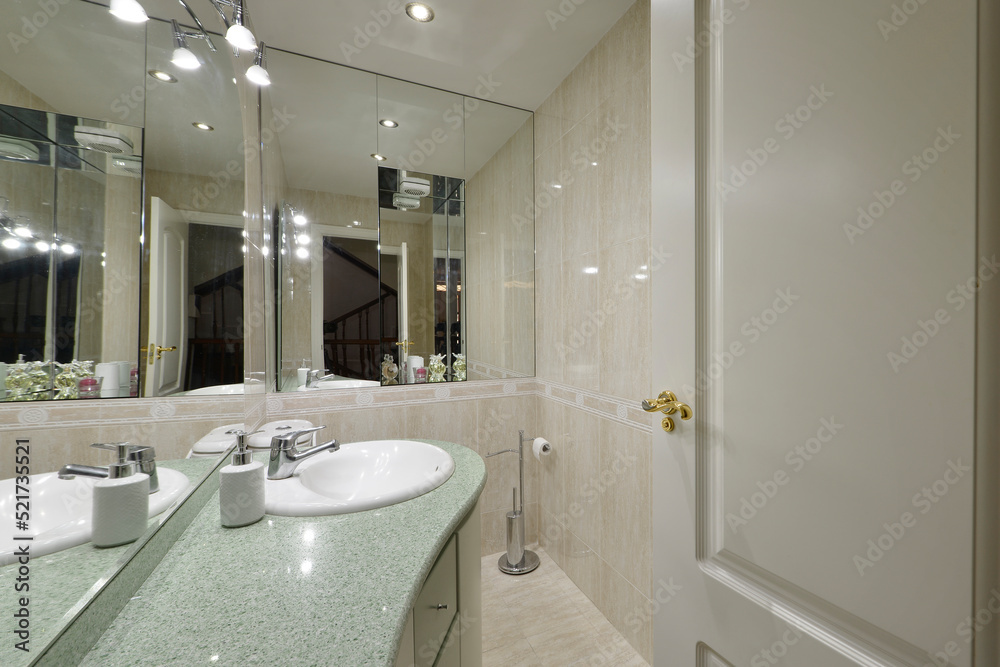 custom made wallpaper toronto digitalBathroom with white porcelain sink on light green stone countertop, large frameless wall mirror, wooden cabinet with drawers and white lacquered door