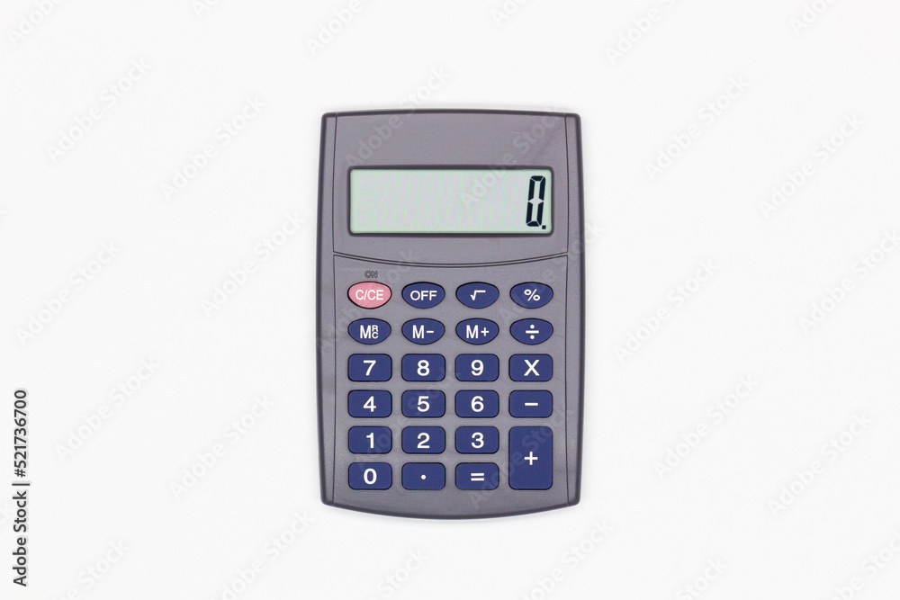 Calculator with big blue buttons and zero on the digital screen on a white background. Solar powered calculator. Electronic machine for math calculations. Business office supplies. Isolated. Close-Up Calculator with big blue buttons and zero on the digital screen on a white background. Solar powered calculator. Electronic machine for math calculations. Business office supplies. Isolated. Close-Up