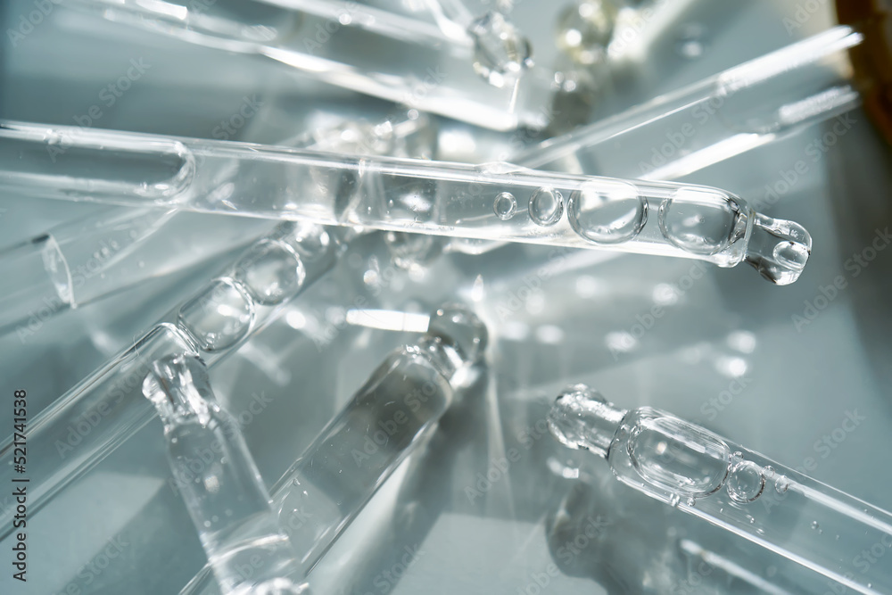 There are a lot of pipettes from cosmetics in one photo. There are a lot of pipettes from cosmetics in one photo.