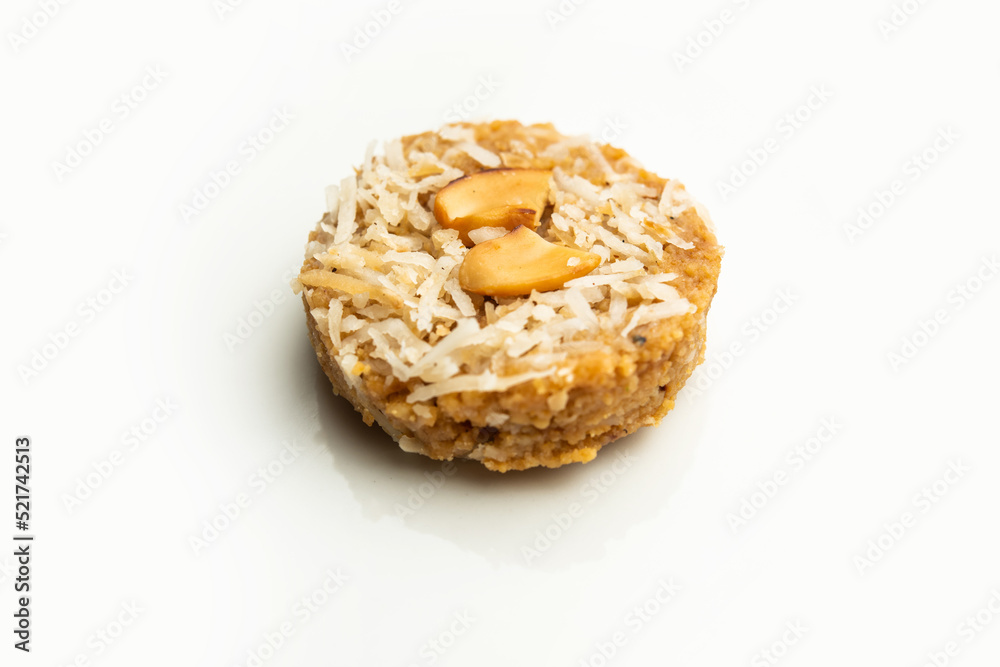 Amrit peda or Amrut pedha or pera is an Indian sweet made from milk and sugar with coconut topping Amrit peda or Amrut pedha or pera is an Indian sweet made from milk and sugar with coconut topping