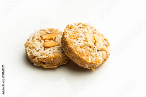 Amrit peda or Amrut pedha or pera is an Indian sweet made from milk and sugar with coconut topping