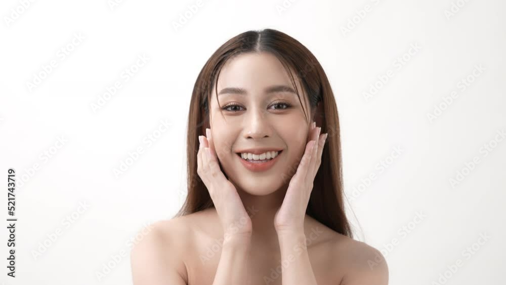 Beauty concept of 4k Resolution. Asian girl is touching her face on a white background. Beauty concept of 4k Resolution. Asian girl is touching her face on a white background.