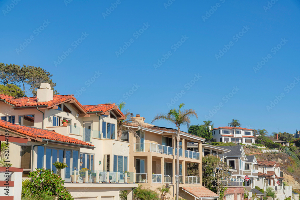Houses with glass railings on decks at San Clemente, California