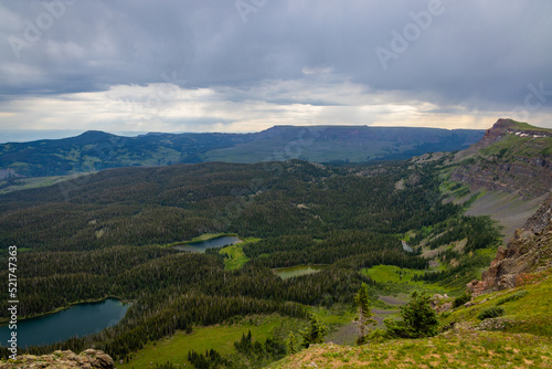 Wilderness lakes under steep mountain cliffs © Glevity