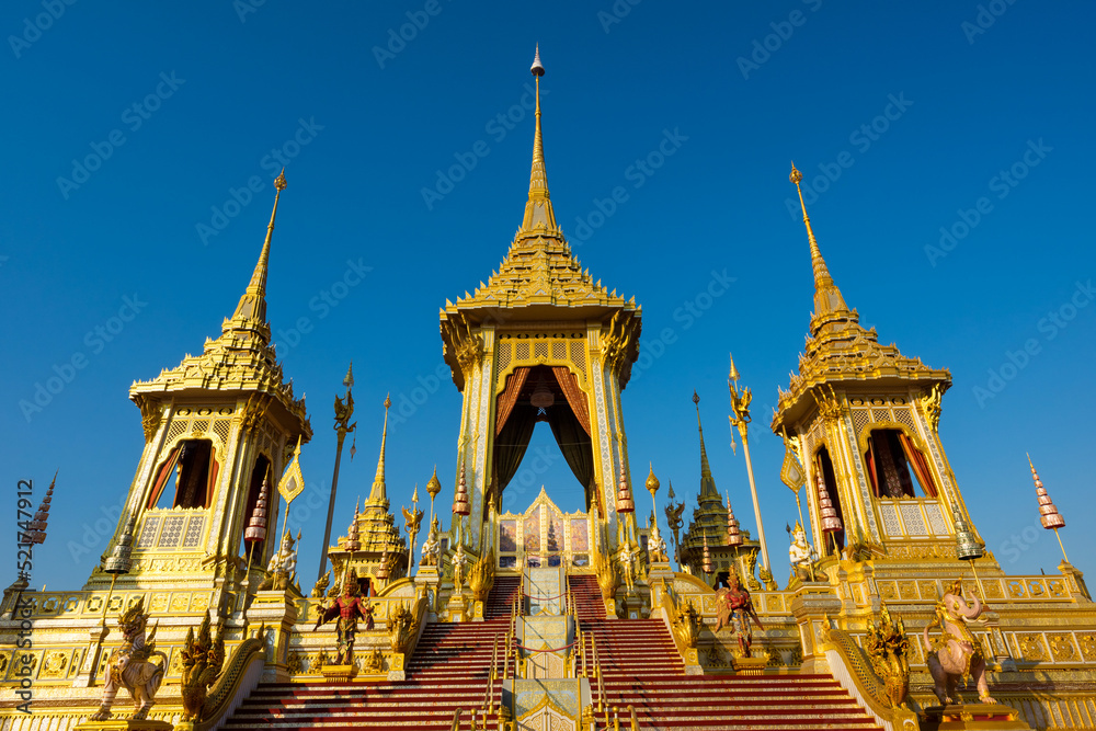 Golden Royal Cremation of King Rama9 against blue sky, Bangkok