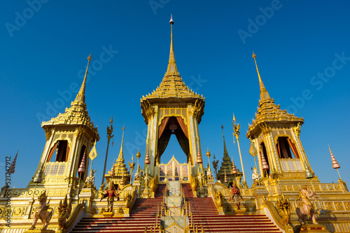 Golden Royal Cremation of King Rama9 against blue sky, Bangkok