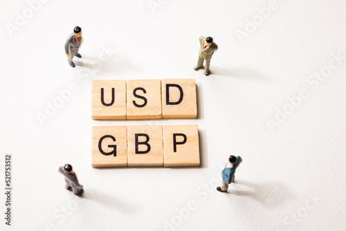 businessman figures meet USD and GBP