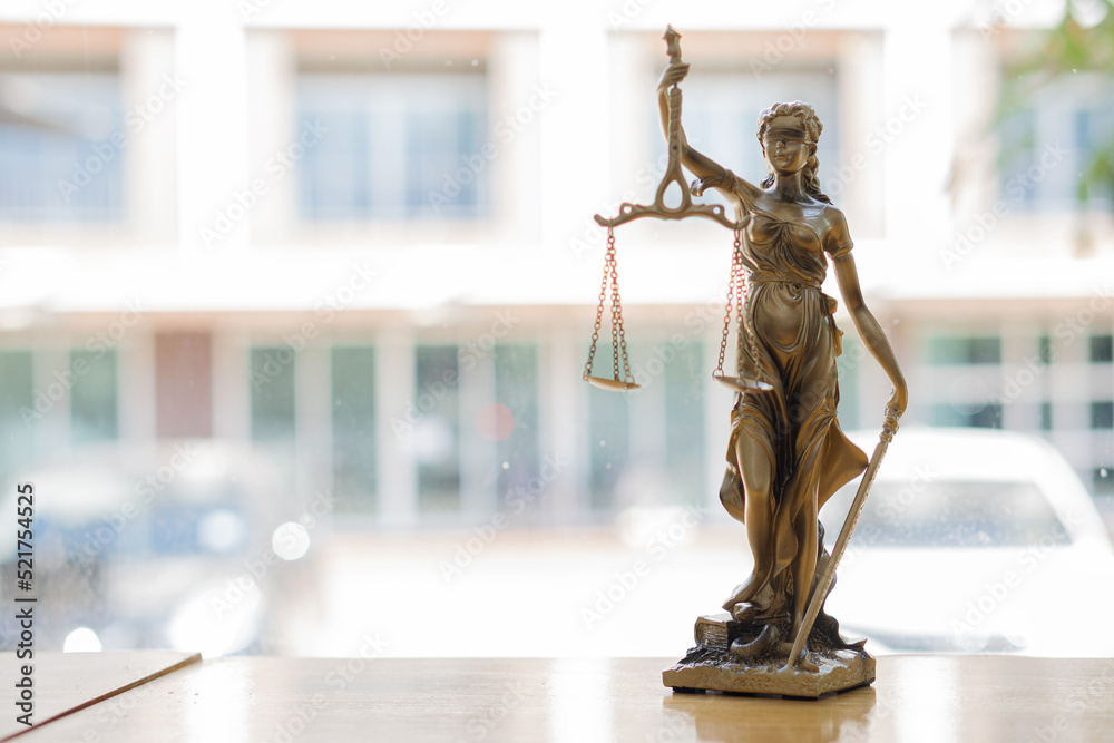 (Goddess of Justice) on a blurred background. Statue of Themis. Concept of law and justice. (Goddess of Justice) on a blurred background. Statue of Themis. Concept of law and justice.