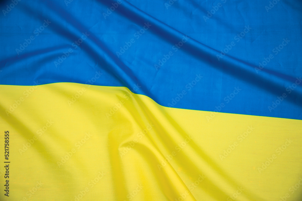 National flag of Ukraine fabric textile background National flag of Ukraine fabric textile background