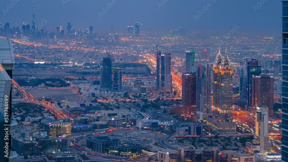 Dubai city at night with high rise futuristic building in Dubai from top view with wide angle Dubai city at night with high rise futuristic building in Dubai from top view with wide angle